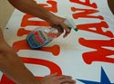 Clean a vinyl banner with soap and water or windex